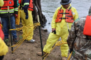Shoreline Anchoring Technique Being Executed for Containment Boom Deployment