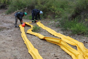 Participants Getting all of the Containment Boom ready for Deployment