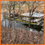 18" contractor boom and sorbent boom deployed around boat slips to prevent oil from spreading in to the area