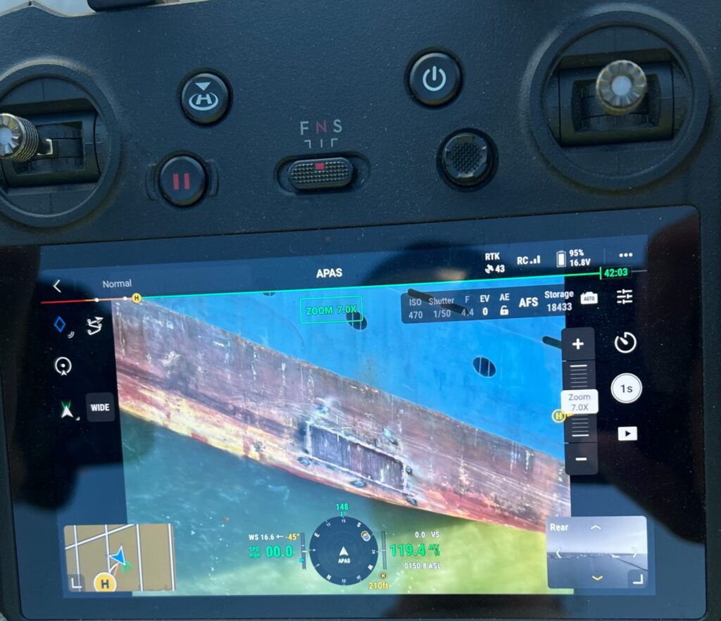A look from the drone controller while flying over the cargo ship after it had been repaired