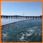 20" offshore containment boom preventively deployed near bridge to keep any spilled oil contained