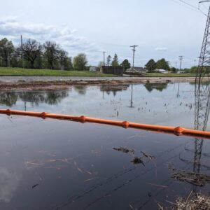 ACME Environmental's 6" oil containment boom deployed