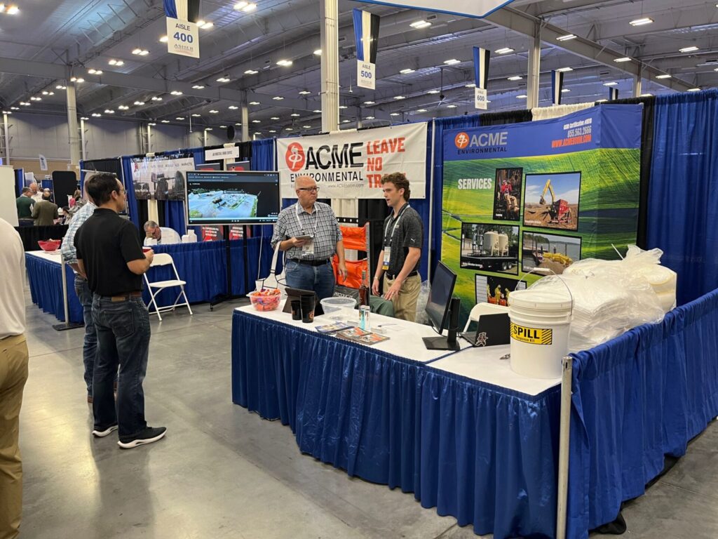 ACME representatives speaking with attendees at the 2025 OERB Trade Show