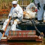 Oil drum skimmer cleaning up thick oil spill