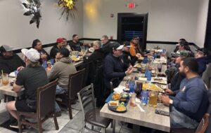 All Boom School Participants and ACME Employees Enjoying Dinner Together