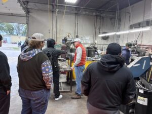 Participants Touring ACME's Facilities and Learning About Our CNC Drilling Machine
