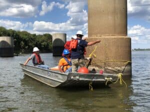 Students of the Boom School learning anchoring and shoring techniques for deploying containment boom