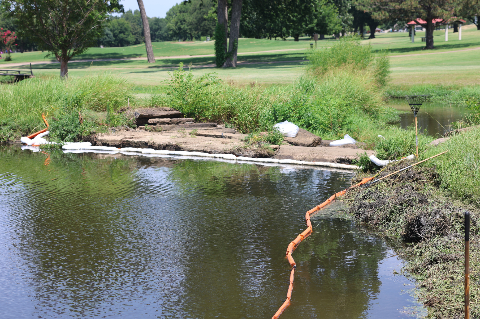 Why Early Spill Response Saves Money 2 ACME Environmental's Sorbent Boom and Mini Boom deployed to keep diesel fuel from escaping a pond and spilling into a creek with 2 bales of Sorbent Pads on hand